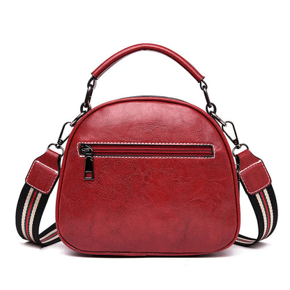 Versatile stitching handbag